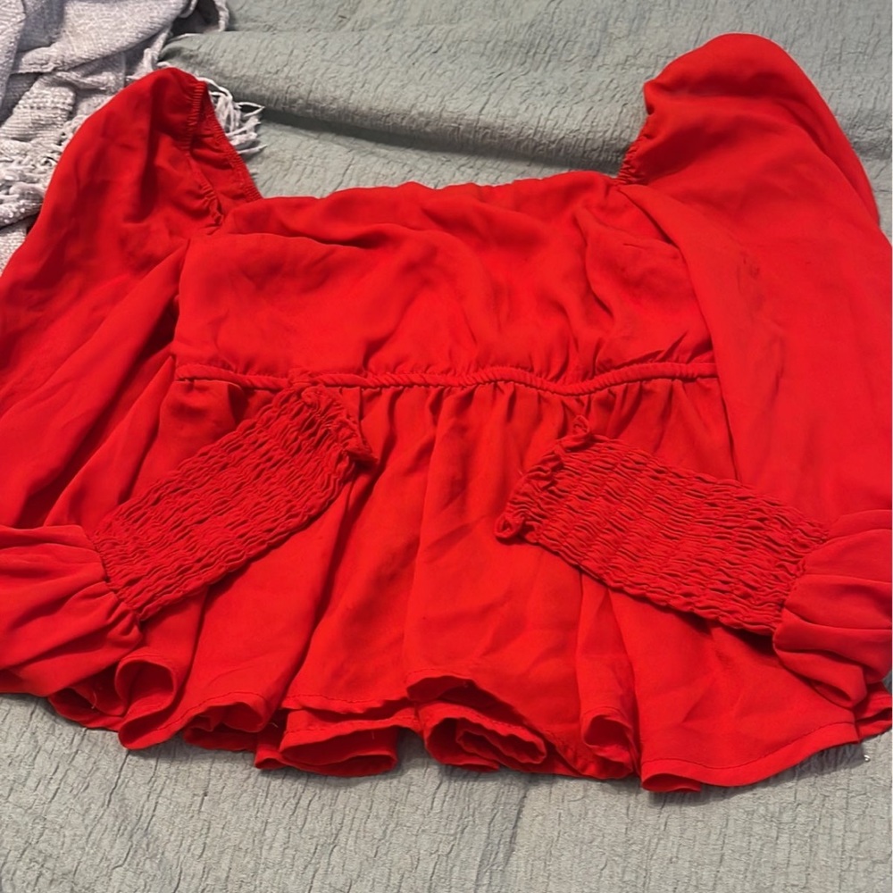 red tight fitting long sleeve
